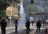Un'azione di repressione compiuta dalla Polizia, durante il G8