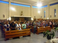 Fedeli e operatori Caritas presenti nella chiesa di San Luigi